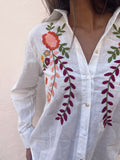 Camisa blanca flores bordadas